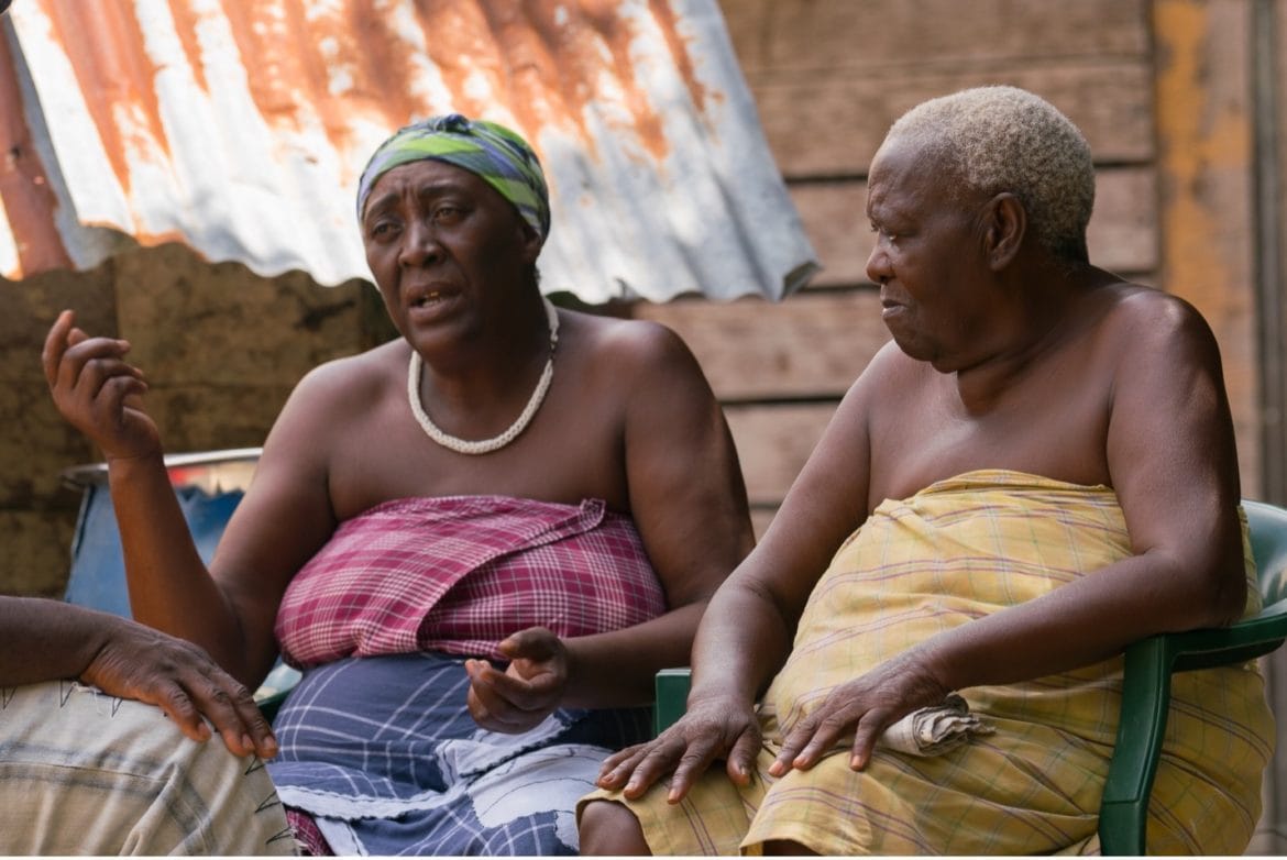 Two Matawai Maroon women collecting oral history