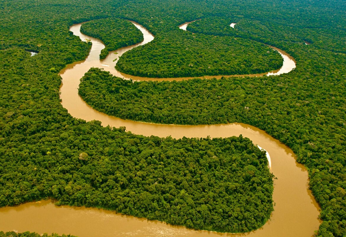 Winding river through the Colombian Amazon Rainforest
