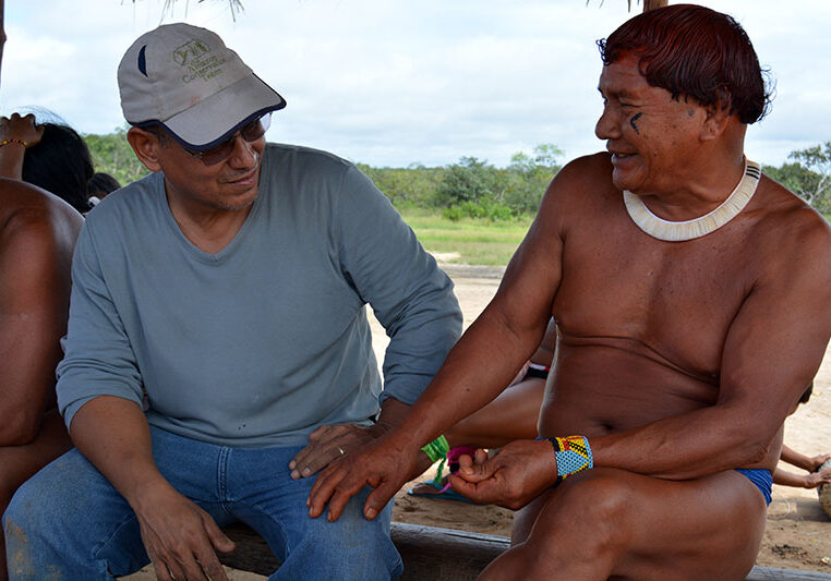 ACT-Brazil Director Joao and Waura Chief Eleukah sitting together